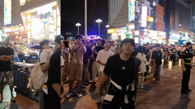 長(zhǎng)沙五一廣場(chǎng)國(guó)慶跳樓驚魂！男子坐在邊沿樓頂 樓下無(wú)數(shù)人圍觀 現(xiàn)場(chǎng)目擊視頻流出！